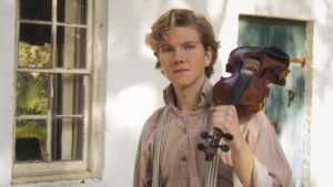 handsome-blonde-haired-young-man-holding-violin